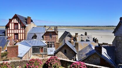 SIMA 2利用Gemini和自我改进技术在未见过的3D和逼真世界中进行泛化